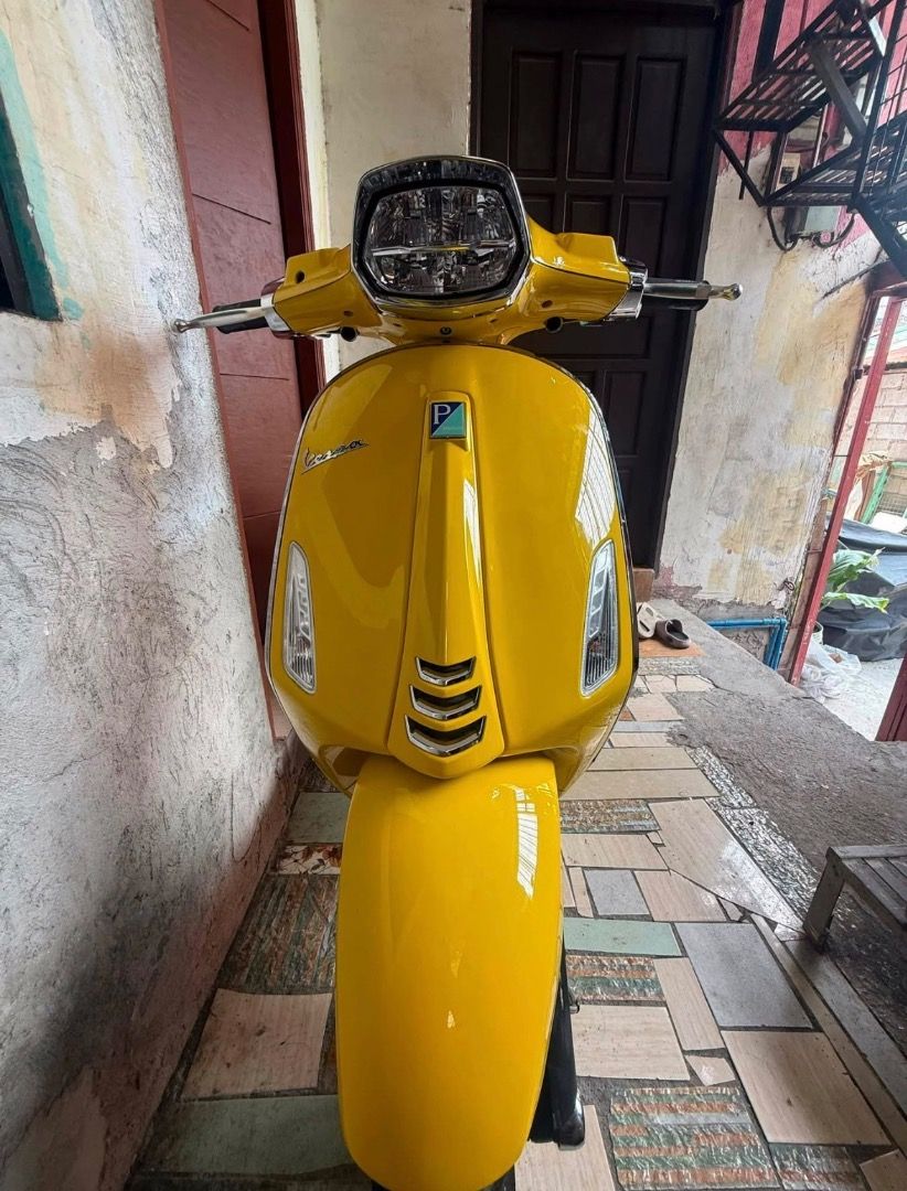 Vespa 150 ABS Yellow Scooter (Category: Motorbikes for Sale) located in Taguig. Submitted by oddfire_e5b557 (Listing ID 1466633452, Image 1). Description: Bright yellow Vespa 150 ABS scooter. Classic design with chrome trim and modern LED headlight. Analog and digital instrument cluster with clear speed gauge up to 140 km/h. Floor board features black rubber strips for grip. Clean bodywork, vibrant paint finish, ready to ride..