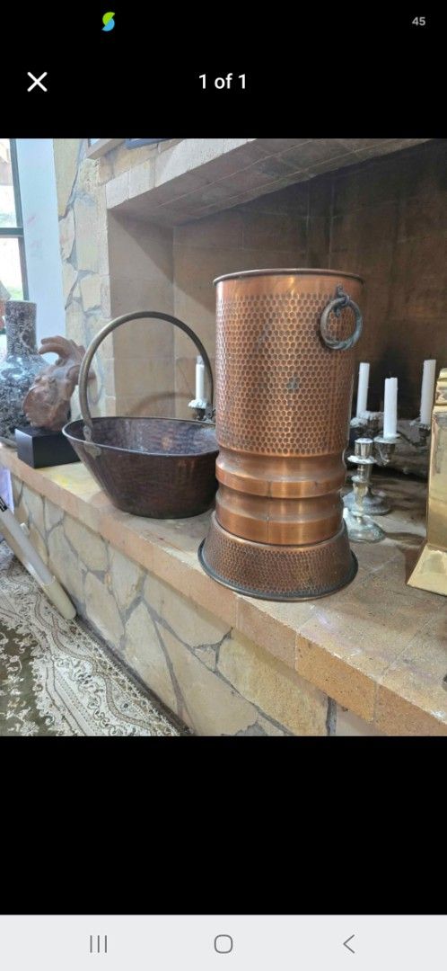 VINTAGE 1890's COPPER CADDY (2 ITEMS) (Category: Vintage Collectibles) located in Cavite. Submitted by mama_decluterring (Listing ID 1466722708, Image 1). Description: - Style: Antique Arts and Crafts - Material: Hand-beaten copper with a beautiful hammered texture - Dimensions: 19 inches high x 11 inches in diameter - Build: Sturdy construction with a solid, quality weight.