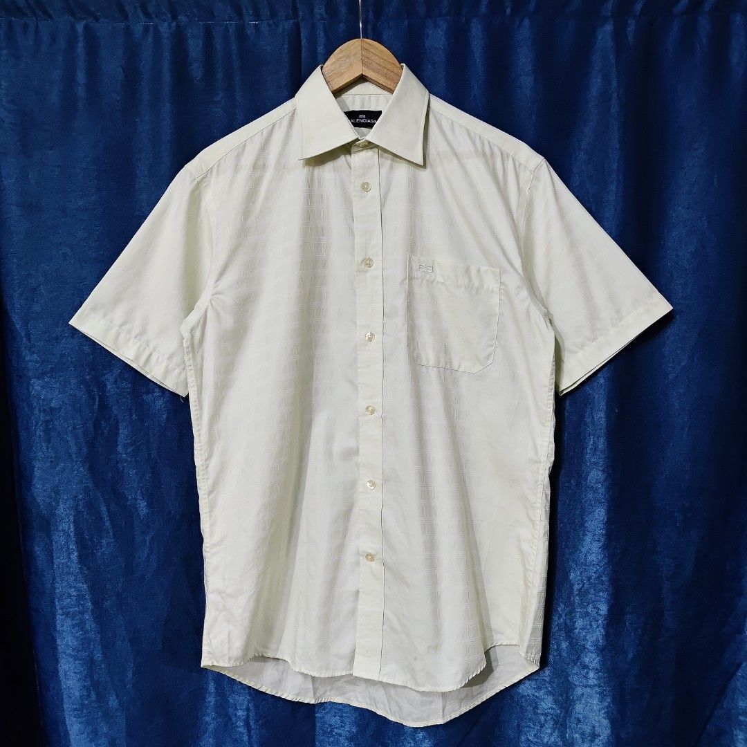 VINTAGE BALENCIAGA BUTTON DOWN POLO (Category: Tshirts & Polo Shirts ) located in Makati City. Submitted by upcycled.closeth (Listing ID 1466613952, Image 1). Description: - Authentic Balenciaga product - Apple Green/ short sleeve - Size: Large to xlarge (men's) - Like new - Authentic - flaws: no flaws - Excellent condition - Need wash, fresh from bale - Features design of Vintage Balenciaga with basic logo embroid on pocket - Material: 100% cott