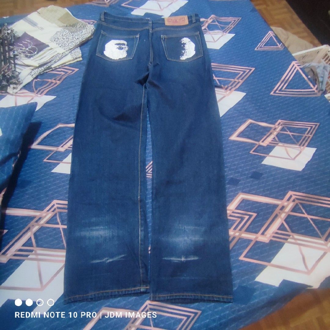 Vintage Bape City Jeans (Category: Jeans) located in Antipolo. Submitted by klashnikov (Listing ID 1466769577, Image 1). Description: - BAPE City Jeans - Classic straight-leg fit - Dark blue wash - Iconic BAPE logo on back pockets - BAPE logo on front pocket - Button closure with BAPE logo Size:XL Dimes: waist 38", Length 42" Tags:complete tags Condition: excellent condition Honest issue: ape logo faded on right pocket see pics Payment option:Ban