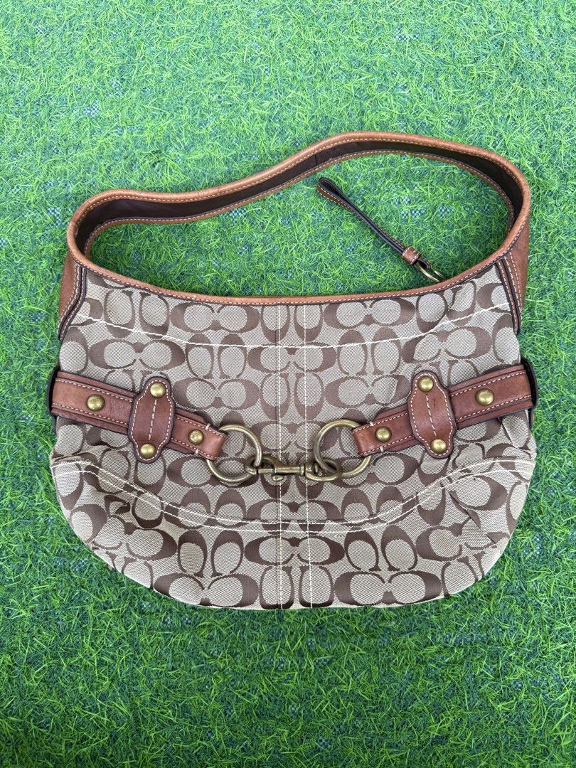 SOLD (Category: Luxury Bags & Wallets) located in Quezon City. Submitted by p0tatooooooo (Listing ID 1466586236, Image 1). Description: A stunning vintage Coach Ergo Belted Shoulder Bag featuring the iconic signature “C” canvas in a classic brown/tan colorway, beautifully accented with rich brown leather trim and antique gold-tone hardware. ✨ Pre-loved vintage condition with visible signs of age/use. Please check photos carefully for the actual c