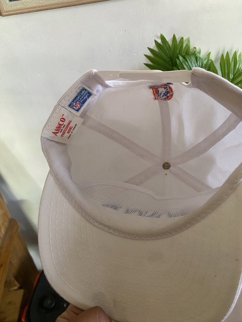 Vintage Denver Broncos Anco Snapback Hat (Category: Caps & Hats) located in Dapitan. Submitted by jadecagatan_4255a7 (Listing ID 1466711028, Image 2). Description: - Brand: Anco - Team: Denver Broncos - Color: White with blue and orange embroidery - Material: 65% polyester, 35% cotton - Closure: Adjustable white plastic snapback - Origin: Officially licensed NFL product made in Taiwan - Size: One size fits all.