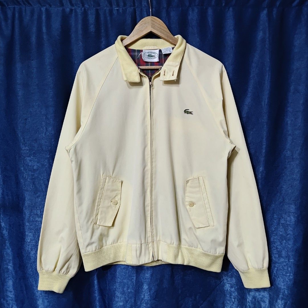 VINTAGE LACOSTE X IZOD HARRINGTON JACKET (Category: Coats, Jackets and Outerwear) located in Makati City. Submitted by upcycled.closeth (Listing ID 1466616726, Image 1). Description: - Authentic Vintage Lacoste product - Light yellow / long sleeve harrington - Size: Large (men's) - Like new - Authentic - flaws: no flaws - Excellent condition - Need wash, fresh from bale - Features design of Lacoste collaboration with Izod Harrington - Material: 1