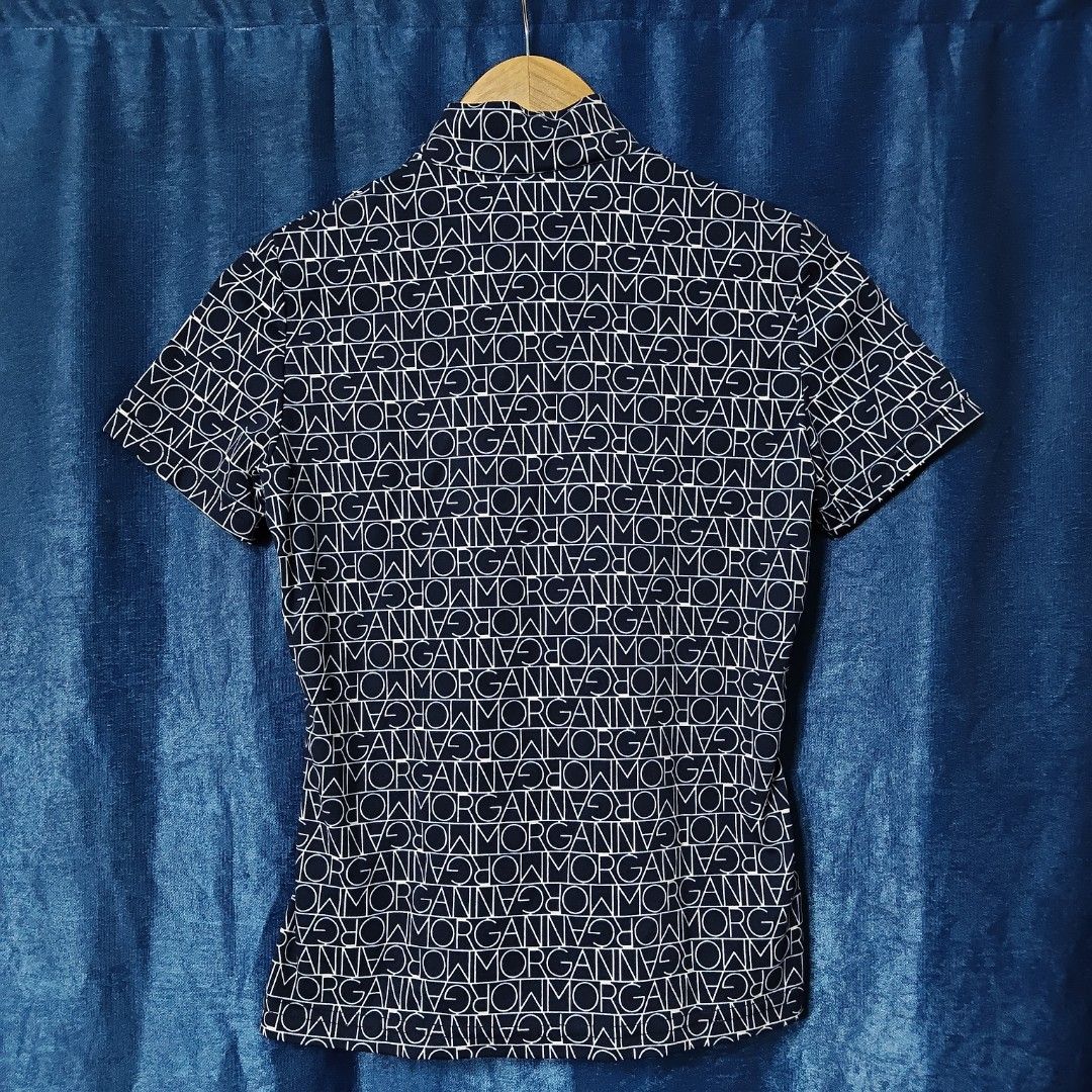 VINTAGE MORGAN DETOI AOP TOPS (Category: Others Tops) located in Makati City. Submitted by upcycled.closeth (Listing ID 1466588641, Image 3). Description: - Authentic Morgan detoi product - Navy blue & White, short-sleeved - Size: Small (women's) - Like new - Authentic - flaws: no flaws - Excellent condition - Need wash, fresh from bale - Features design of Morgan detoi all over print tops - Material: 100% nylon !!STILL NEGOTIABLE!!.