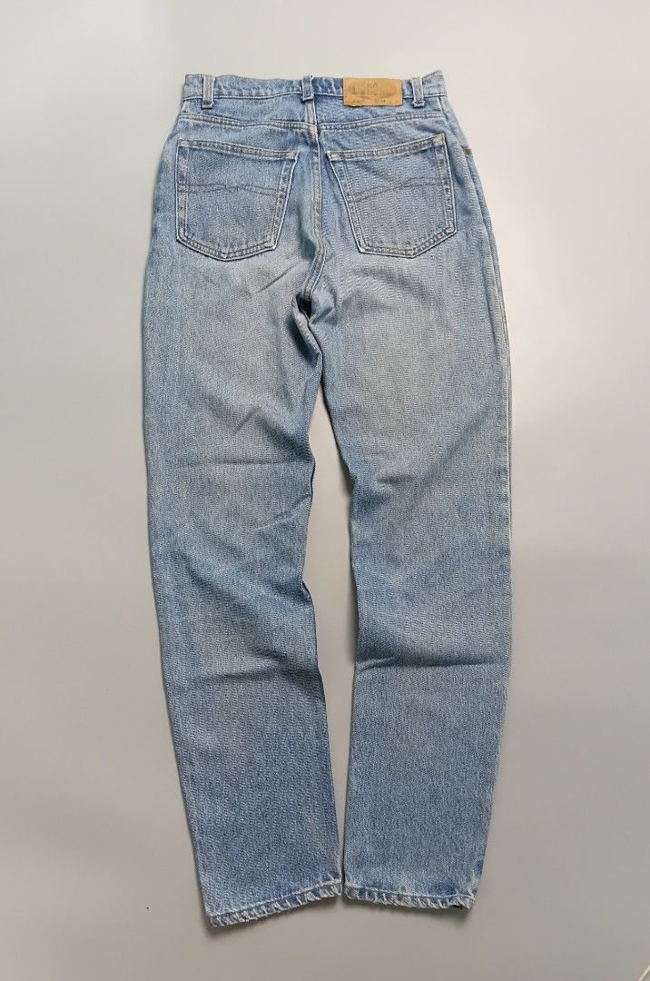 Vintage No Limits light-wash denim jeans. (Category: Jeans) located in Manila. Submitted by hustler_777 (Listing ID 1466675507, Image 2). Description: Design Features Silhouette: They feature a classic high-rise, straight-leg cut typical of vintage 1980s or 1990s styling. Front Pockets: Standard curved scoop pockets with a small coin/watch pocket on the right side. Fly & Waist: A traditional zip fly with a single metal button closure at the waist