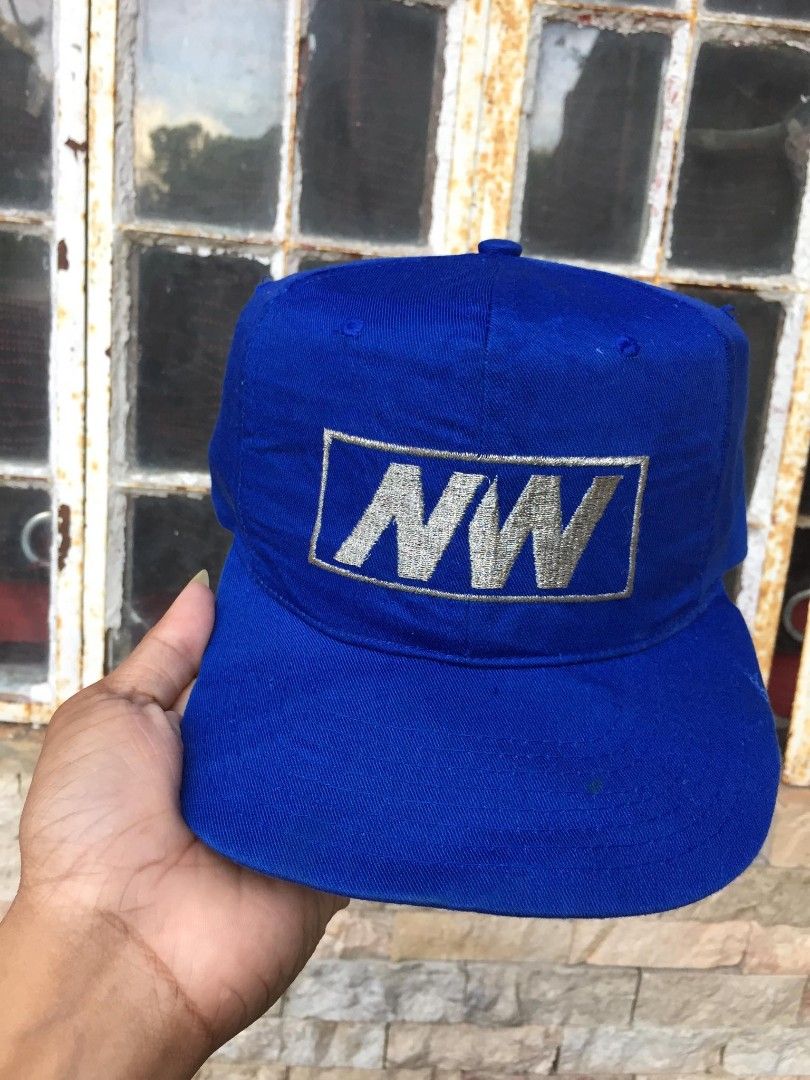 Vintage NW Cotton Blue Snapback Cap (Category: Caps & Hats) located in Naga. Submitted by bonethugz1822 (Listing ID 1466567346, Image 1). Description: Silver stitch embroid Verygood condition Colorate 9/10 No issues (Ang brim need lang hilotin) 550+sf.