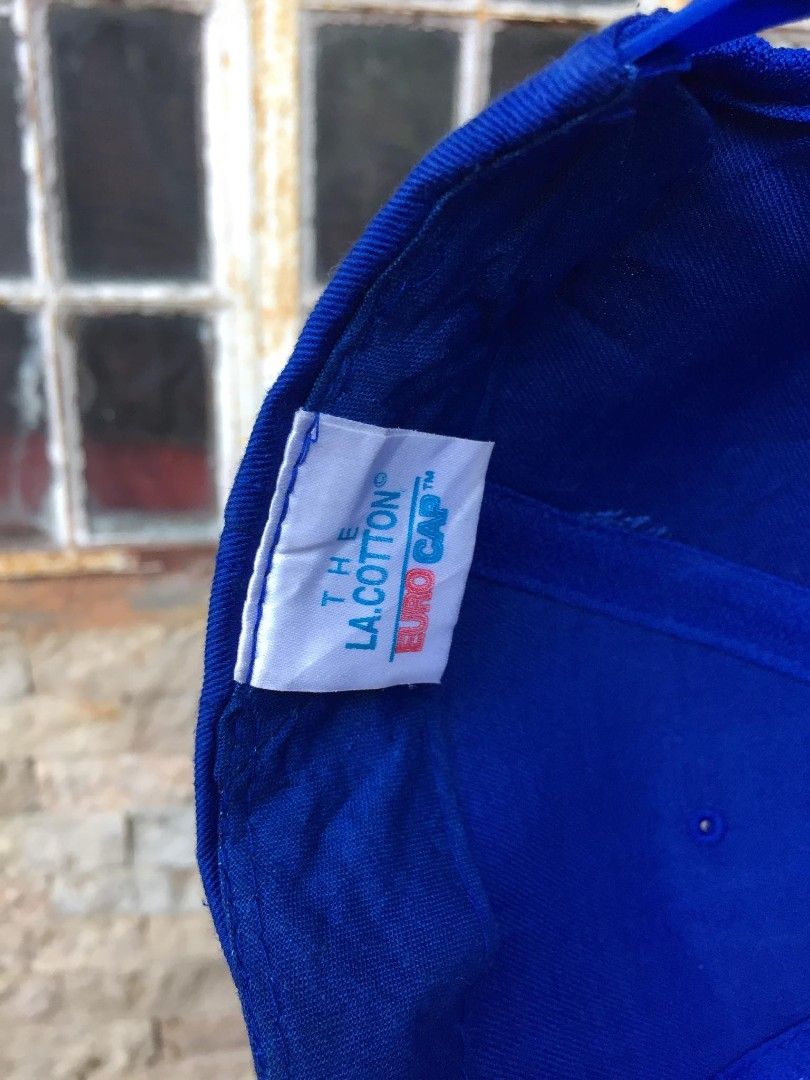 Vintage NW Cotton Blue Snapback Cap (Category: Caps & Hats) located in Naga. Submitted by bonethugz1822 (Listing ID 1466567346, Image 3). Description: Silver stitch embroid Verygood condition Colorate 9/10 No issues (Ang brim need lang hilotin) 550+sf.