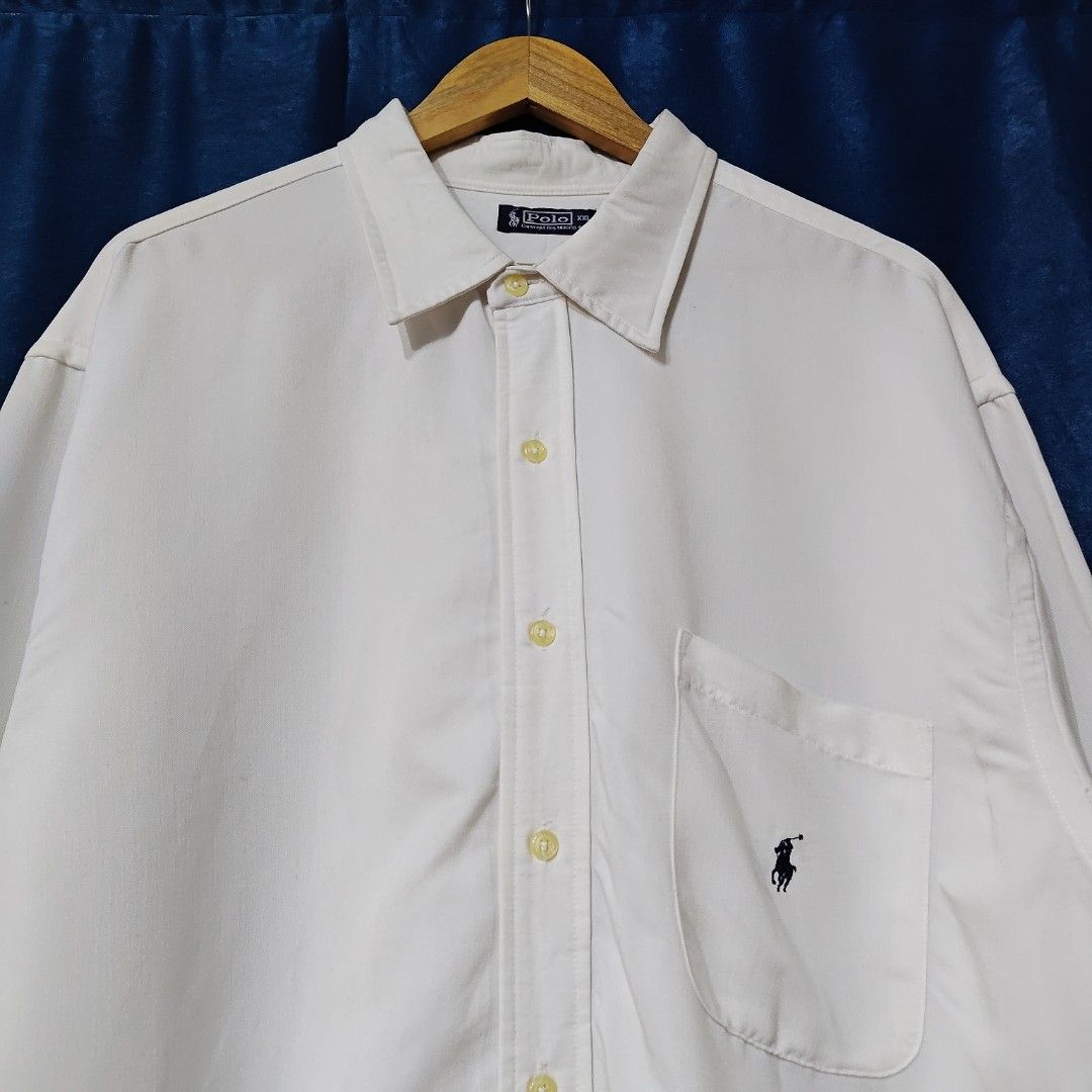 VINTAGE POLO RALPH LAUREN BUTTON DOWN LONGSLEEVE (Category: Tshirts & Polo Shirts ) located in Makati City. Submitted by upcycled.closeth (Listing ID 1466594657, Image 2). Description: - Authentic Vintage Ralph Lauren product - White, Long sleeved - Size: 2X-Large (men's) - Like new - Authentic - flaws: no flaws - Excellent condition - Need wash, fresh from bale - Features design of Ralph Lauren button down longsleeve basic logo - Material: 100% 