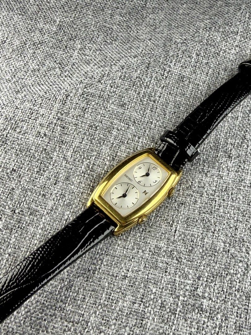 Vintage Seiko Noei Dual Time (Category: Women's Watches) located in Bacoor. Submitted by offtheclock (Listing ID 1466637708, Image 1). Description: Vintage Seiko Noei Dual Time Condition: Pre-owned Reference No: 1E20-3A00 Movement: Quartz (1E20) Material: Stainless Steel Gold-Plated Finish Case Diameter: 21x34mm (Hardlex Mineral Crystal) Dial: White / Light Silver Finish Strap: Brandnew Aftermarket Black Leather Strap Inclusion: Replacement Box P