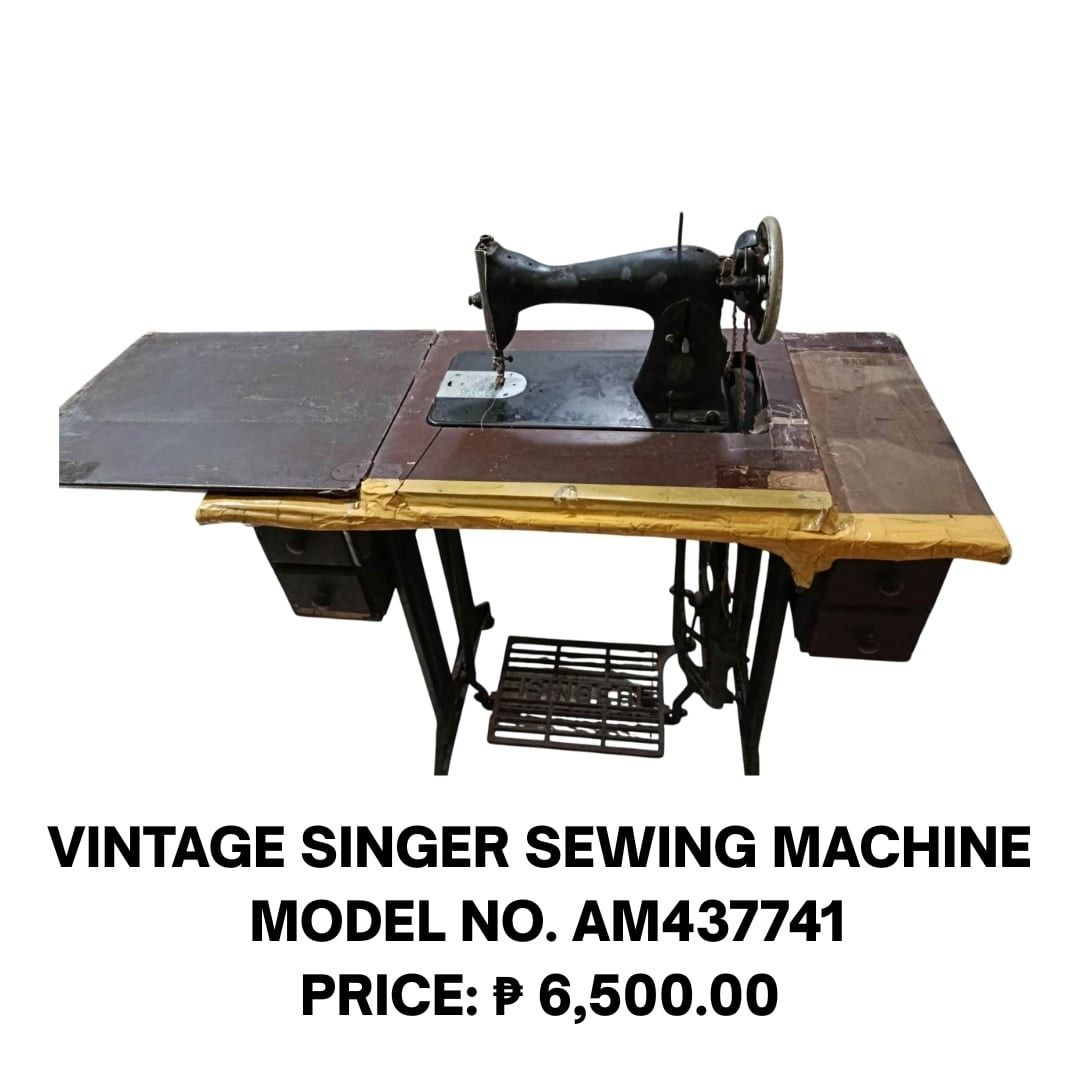 VINTAGE SINGER SEWING MACHINE MODEL NO. AM437741 (Negros Oriental Only) (Category: Everything Else Others) located in Manila. Submitted by jjwebshop2026 (Listing ID 1466569353, Image 1). Description: - Authentic vintage Singer sewing machine with classic black finish - Sturdy cast iron treadle base with traditional foot pedal mechanism - Wooden cabinet featuring side drawers for storage - Visible wear and aging on the wooden table surface, includ