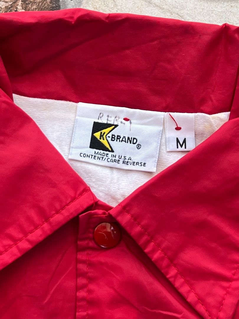 Vintage TISCO Red Nylon Coach Jacket Windbreaker (Category: Coats, Jackets and Outerwear) located in Caloocan City. Submitted by sillapwet0606 (Listing ID 1466569358, Image 3). Description: - Color: Vibrant red - Material: Lightweight nylon outer layer - Features: Pointed collar, snap-button front closure, and ribbed sleeve cuffs - Branding: White embroidered TISCO tractor logo on the chest - Versatility: Perfect casual outerwear to throw over a 