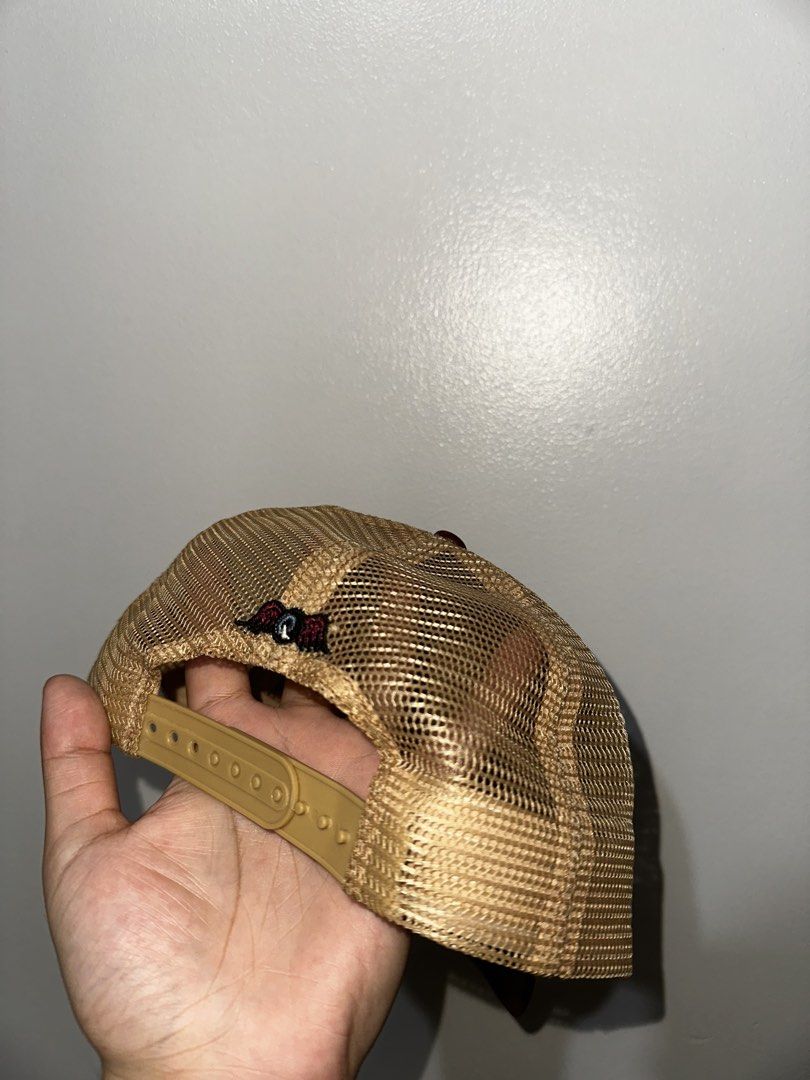 Von Dutch Trucker Hat Maroon and Tan (Category: Caps & Hats) located in Manila. Submitted by driftthrift (Listing ID 1466760221, Image 2). Description: - Brand: Von Dutch - Color: Maroon front with tan mesh back - Design: Gold embroidered logo patch and leather-look brim - Closure: Adjustable snapback - Condition: Clean overall, with clear inside tags for authenticity.