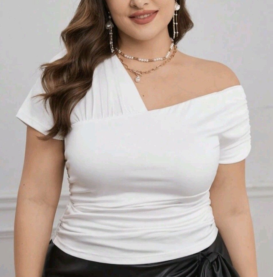 White Asymmetric Ruched One-Shoulder Top (Category: Sleeveless) located in Cabuyao City. Submitted by gaile29 (Listing ID 1466619217, Image 3). Description: - Trendy asymmetric one-shoulder design - Flattering gathered pleats on the front - Stylish ruched short sleeves - Soft and stretchy slim-fit fabric for all-day comfort - Versatile piece, easily pairs with skirts or trousers.