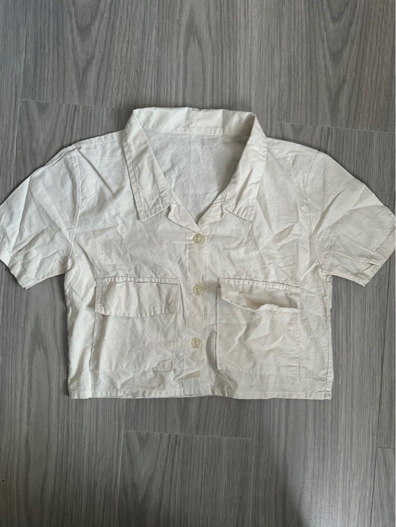 Cream Cropped Linen Button-Down Shirt with Utility Pockets (Category: Blouses) located in Mandaluyong City. Submitted by deerselu (Listing ID 1466603599, Image 1). Description: .