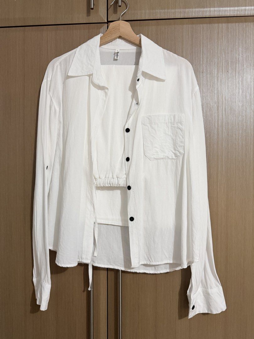 White Button Up Shirt and Skirt Set (Category: Sets or Coordinates) located in Taguig. Submitted by mengxir20193848 (Listing ID 1466678861, Image 2). Description: - Style: Matching white two-piece set (long-sleeve button-up shirt & midi skirt) - Details: Contrast black buttons, chest pocket, and an adjustable elastic drawstring waistband - Material: Lightweight and breathable, ideal for sunny days - Condition: Worn only once, super clean and like