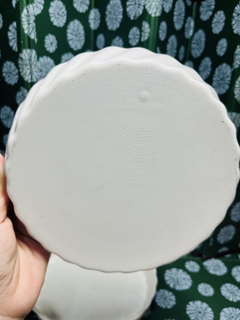 White ceramic ruffled pie dish baking pan (Category: Bakeware) located in Malabon City. Submitted by mgsurplus (Listing ID 1466565628, Image 3). Description: - Set of 2 white ceramic tart pans - Classic round shape with elegant fluted edges - Dimensions: ~7 inches diameter, ~2 inches depth - Durable build with a smooth, glossy glazed finish - Ideal for baking quiches, tarts, and homemade pies - Clean bottoms featuring standard kiln marks.