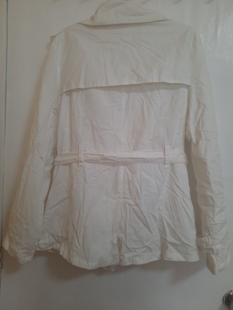 White Double-Breasted Trench Coat / Jacket with Belt (Category: Coats, Jackets and Outerwear) located in Quezon City. Submitted by dannikkishoppe2 (Listing ID 1466613871, Image 3). Description: White Double-Breasted Trench Coat / Jacket with Belt ‼️₱280‼️ • Style: Double-breasted front with buttons, lapel collar, belted waist with buckle, and zippered pocket details • Measurements: ◦ Chest: 17 inches (flat lay, armpit to armpit) ◦ Length: 25 inch