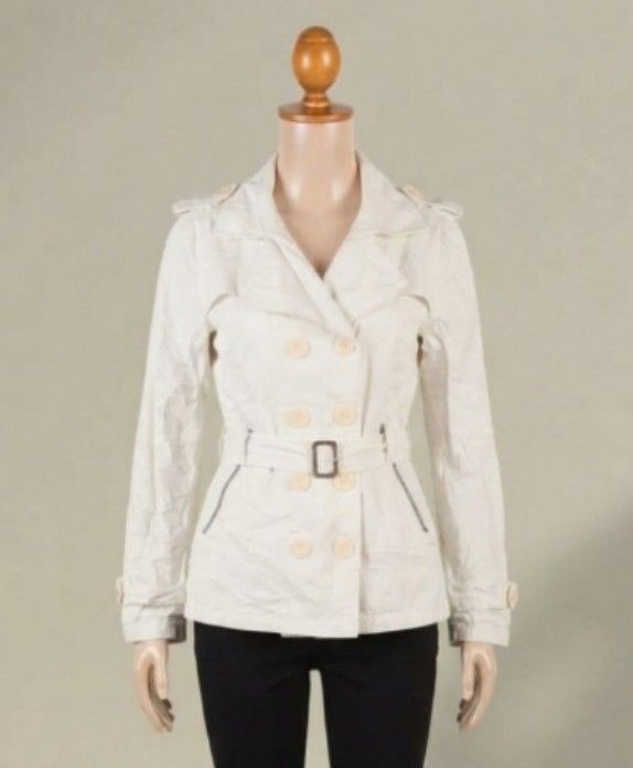 White Double-Breasted Trench Coat / Jacket with Belt (Category: Coats, Jackets and Outerwear) located in Quezon City. Submitted by dannikkishoppe2 (Listing ID 1466613871, Image 1). Description: White Double-Breasted Trench Coat / Jacket with Belt ‼️₱280‼️ • Style: Double-breasted front with buttons, lapel collar, belted waist with buckle, and zippered pocket details • Measurements: ◦ Chest: 17 inches (flat lay, armpit to armpit) ◦ Length: 25 inch