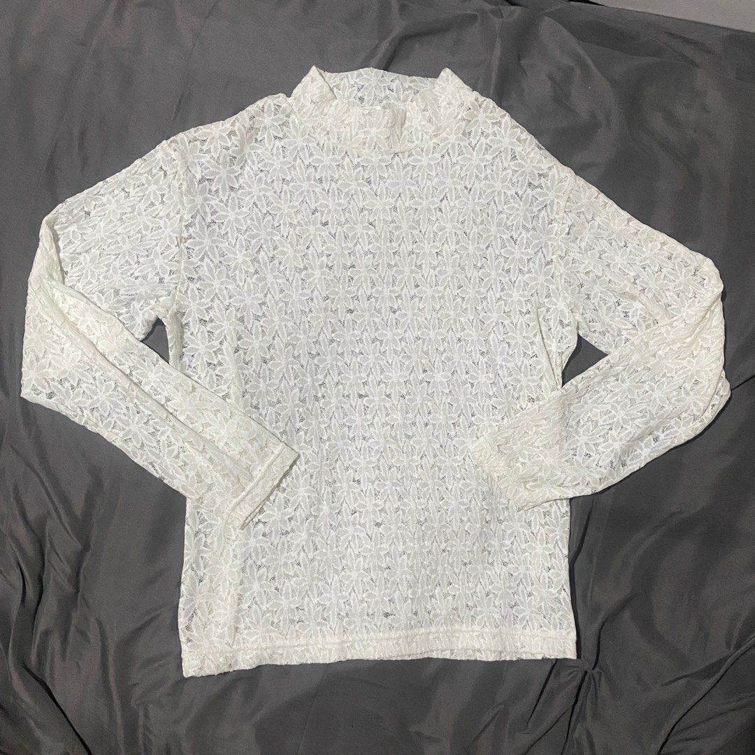 White lace long sleeve top floral pattern sheer (Category: Longsleeves) located in Manila. Submitted by faerikhae (Listing ID 1466741058, Image 1). Description: - Color: White - Material: Sheer, lightweight lace with delicate floral pattern - Design: Long sleeves with stretchy neckline and cuffs - Fit: Comfortable and versatile basic piece - Styling: Best paired by layering over a camisole or bralette.