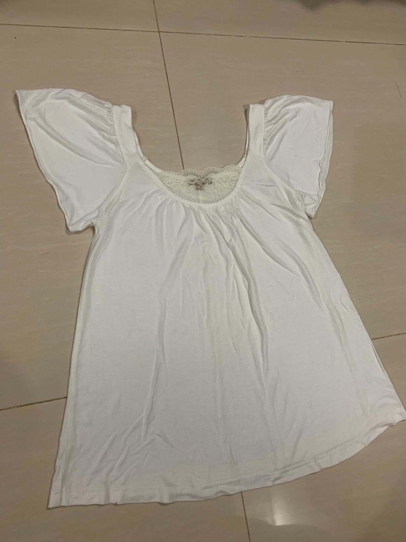 White lace trim blouse with flutter sleeves (Category: Blouses) located in Tiaong. Submitted by cdoswan (Listing ID 1466731883, Image 3). Description: good condition.