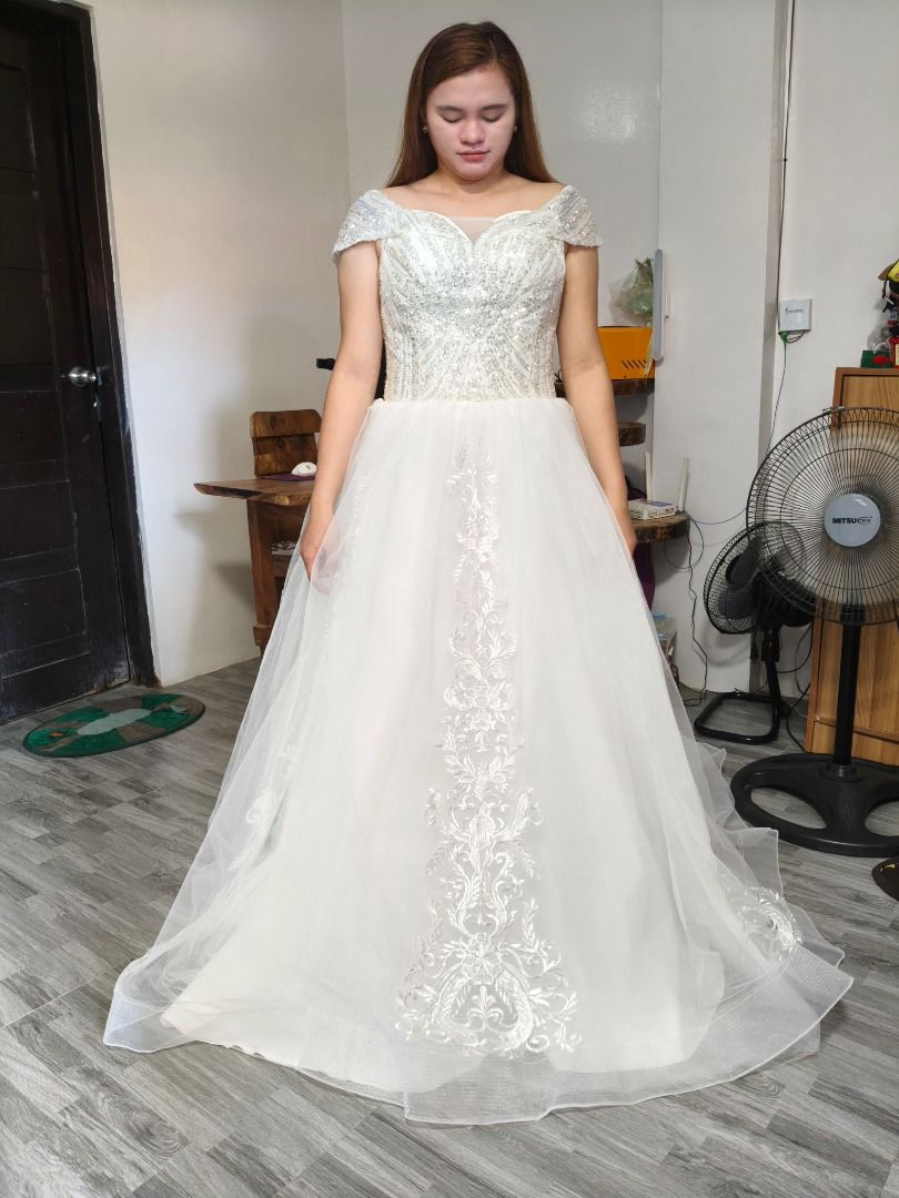 White Off-Shoulder Wedding Gown with Sequins and Train (Category: Evening dresses & gowns) located in Santa. Submitted by pink18w3ar (Listing ID 1466565507, Image 1). Description: - Style: Off-shoulder wedding gown - Bodice: Heavily beaded with sparkly sequins - Skirt: Tulle with intricate lace embroidery on the center front and long train - Back: Lace-up corset with satin ribbon closure - Condition: Worn once, professionally cleaned - Ideal for: