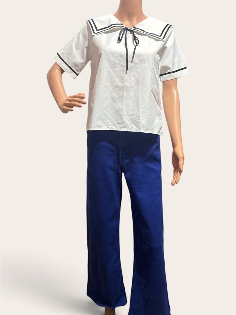 White Sailor Blouse with satin bow (Category: Blouses) located in Pasig City. Submitted by burtonxxx (Listing ID 1466622756, Image 3). Description: 18x 21 No flaws Code: noki.