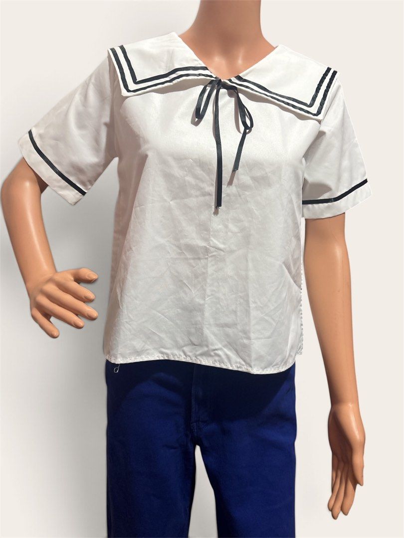 White Sailor Blouse with satin bow (Category: Blouses) located in Pasig City. Submitted by burtonxxx (Listing ID 1466622756, Image 1). Description: 18x 21 No flaws Code: noki.