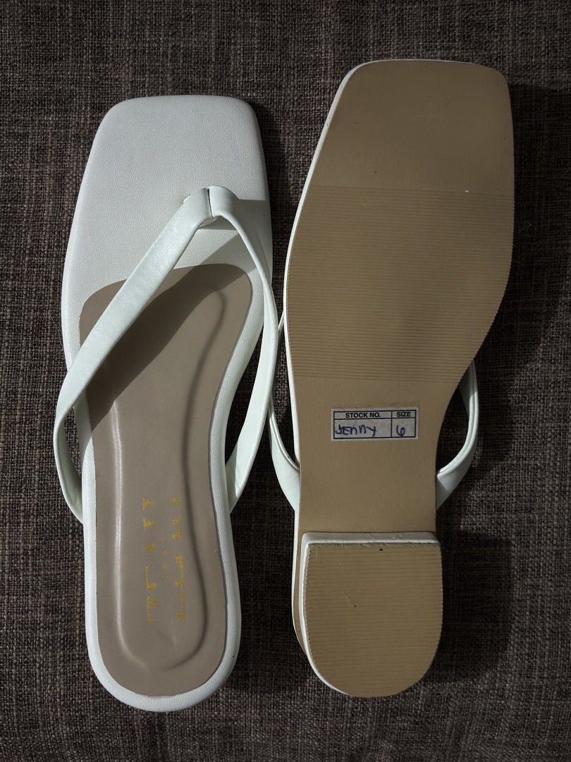 white sandals w 1 inch heels (Category: Sandals) located in Manila. Submitted by k4lis.closet (Listing ID 1466575787, Image 2). Description: NEVER BEEN USED reason for selling: hindi bagay sa paa ko .
