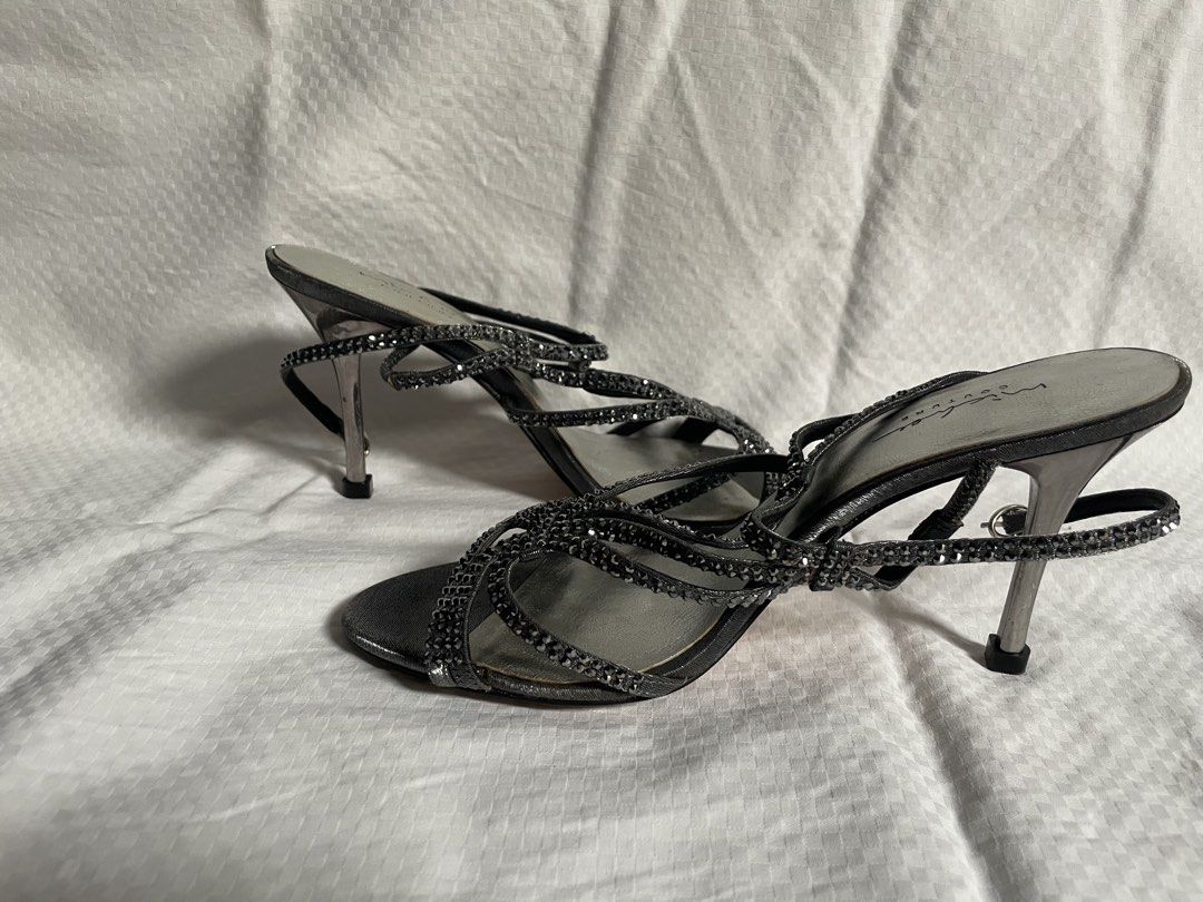 Womens heels (Category: Heels) located in Manila. Submitted by nina122386 (Listing ID 1466622787, Image 1). Description: Size 38 on tag but runs small. Michel couture. (Hk brand).
