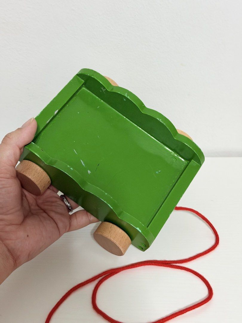 Wooden Pull Toy With Blocks (Category: Educational & Learning Toys) located in Quezon City. Submitted by treasures.delight (Listing ID 1466576836, Image 3). Description: pull toy with free blocks preloved • good condition • with free blocks price: ₱100 * This vibrant wooden block pull cart promotes gross motor development and stability as toddlers practice walking and navigating while pulling the cart along. It also boosts early cognitive and fin