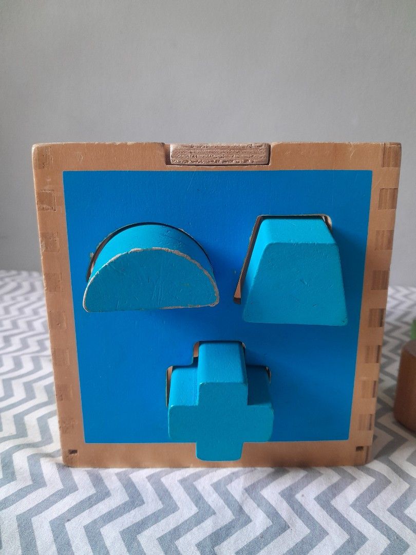 Wooden Shape Sorter (Category: Educational & Learning Toys) located in Pasig City. Submitted by three.babybears (Listing ID 1466588388, Image 3). Description: 3 shapes missing, replaced with shapes that somehow fit (pls check all photos).