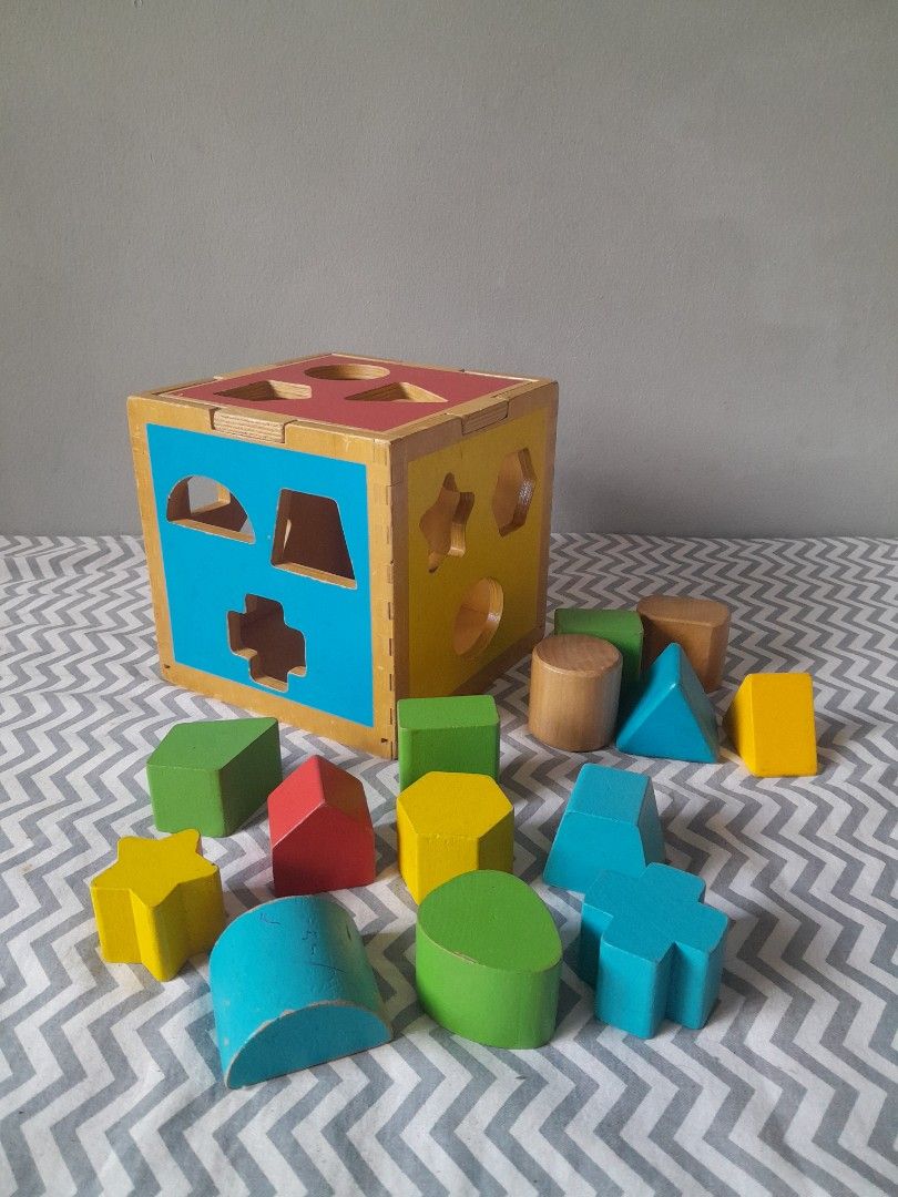Wooden Shape Sorter (Category: Educational & Learning Toys) located in Pasig City. Submitted by three.babybears (Listing ID 1466588388, Image 1). Description: 3 shapes missing, replaced with shapes that somehow fit (pls check all photos).