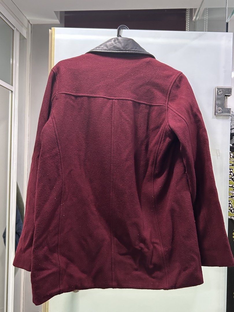 Wool Jacket (Category: Coats, Jackets and Outerwear) located in Petaling Jaya. Submitted by megabytese (Listing ID 1466580246, Image 2). Description: - Brand: Religion - Material: Deep maroon wool blend - Accents: Contrasting black leather collar and pocket details - Closure & Pockets: Asymmetric front zip with front and side zippered pockets - Lining: Fully lined in black fabric - Size: L / 14 / 42 - Condition/Vibe: Great statement piece for coo