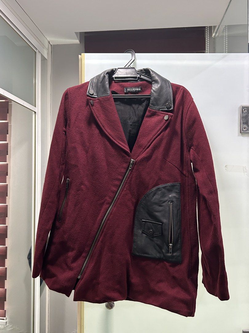Wool Jacket (Category: Coats, Jackets and Outerwear) located in Petaling Jaya. Submitted by megabytese (Listing ID 1466580246, Image 1). Description: - Brand: Religion - Material: Deep maroon wool blend - Accents: Contrasting black leather collar and pocket details - Closure & Pockets: Asymmetric front zip with front and side zippered pockets - Lining: Fully lined in black fabric - Size: L / 14 / 42 - Condition/Vibe: Great statement piece for coo