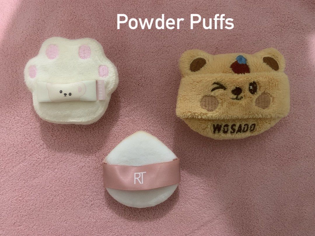 Wosado and Real Techniques Powder Puffs Bundle (Category: Makeup) located in General Trias. Submitted by clairexlaundromat (Listing ID 1466577618, Image 1). Description: - Set of 3 ultra-soft makeup puffs - Includes Wosado white cat paw and brown bear designs - Includes pink Real Techniques triangle puff with a convenient ribbon strap - Made with plush material for a smooth and seamless application - Perfect for daily makeup routines, setting fou