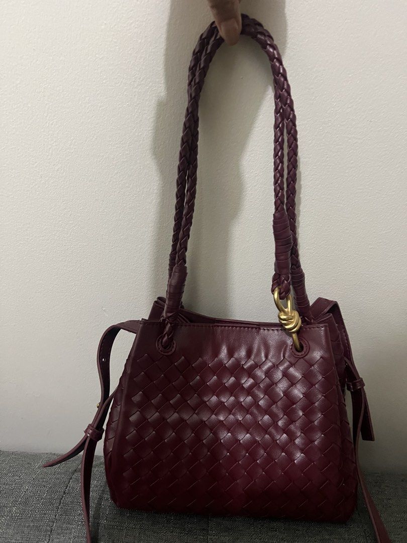 Small woven parachute bag (Category: Cross-body Bags) located in Manila. Submitted by aj3luv (Listing ID 1466663624, Image 1). Description: - color: red wine - In soft leather - it comes with long strap and inner wallet - can be shoulder or crossbody bag .