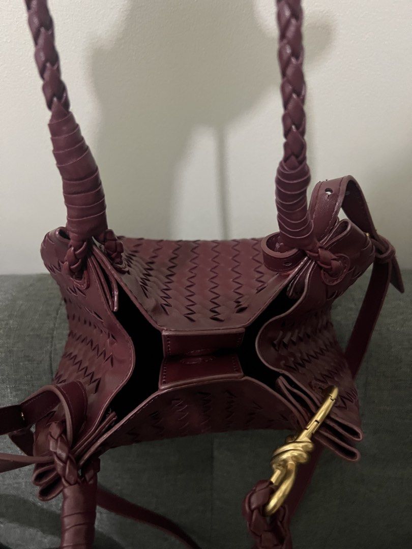 Small woven parachute bag (Category: Cross-body Bags) located in Manila. Submitted by aj3luv (Listing ID 1466663624, Image 3). Description: - color: red wine - In soft leather - it comes with long strap and inner wallet - can be shoulder or crossbody bag .