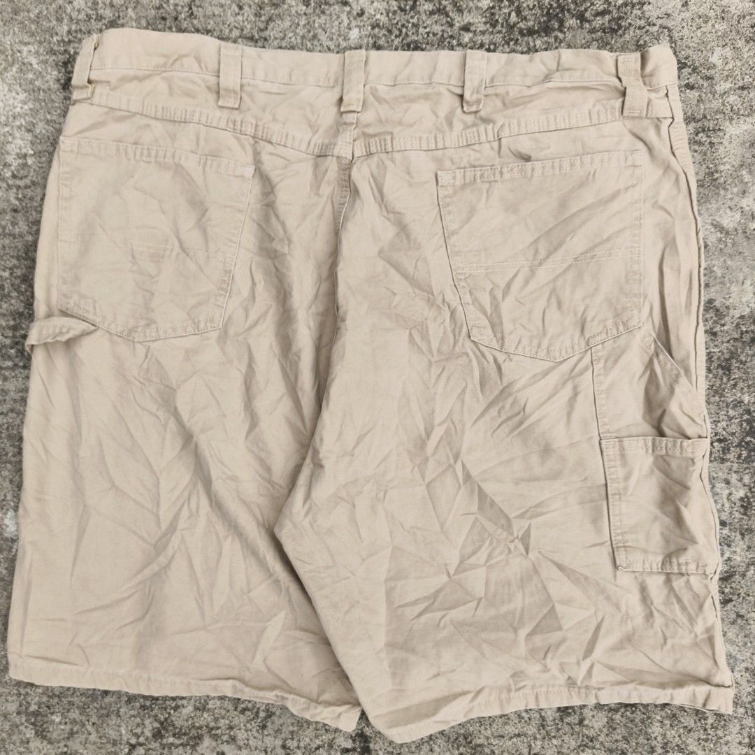 Wrangler 250 shipped (Category: Shorts) located in Bacolod City. Submitted by loothingsph (Listing ID 1466701446, Image 2). Description: 300 shipped - Color: Khaki - Material: Durable cotton fabric - Fit: Relaxed fit through the thighs - Closure: Front button closure with belt loops - Storage: Multiple functional pockets plus a dedicated tool pocket on the right leg - Issue stains & missing patch Waist - 44 Length - 24 Leg Opening - 13.9.