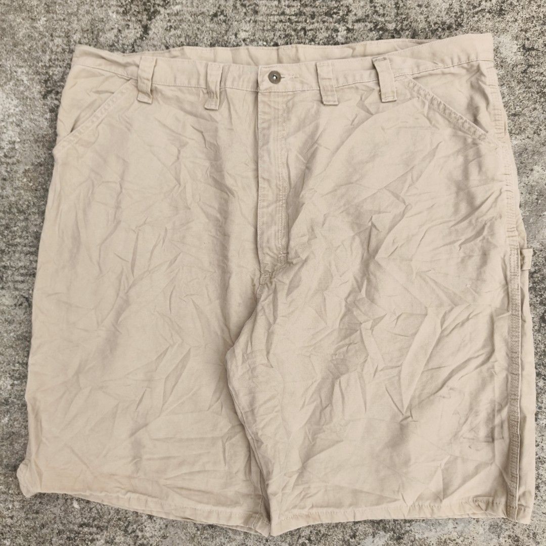 Wrangler 250 shipped (Category: Shorts) located in Bacolod City. Submitted by loothingsph (Listing ID 1466701446, Image 1). Description: 300 shipped - Color: Khaki - Material: Durable cotton fabric - Fit: Relaxed fit through the thighs - Closure: Front button closure with belt loops - Storage: Multiple functional pockets plus a dedicated tool pocket on the right leg - Issue stains & missing patch Waist - 44 Length - 24 Leg Opening - 13.9.