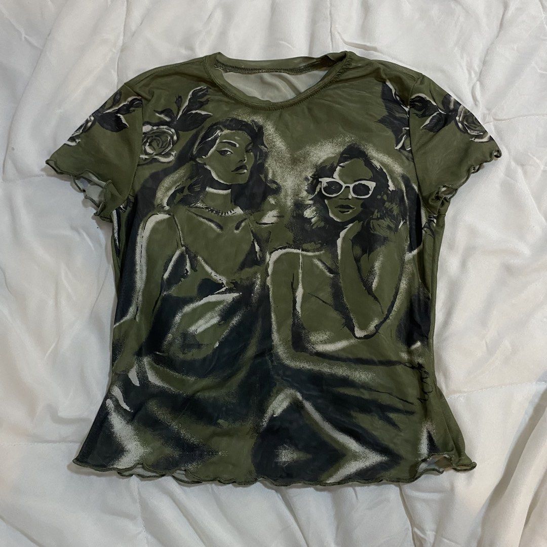 Y2K Graphic Meshed Top (Category: Shirts) located in Manila. Submitted by sugarcane888 (Listing ID 1466706360, Image 2). Description: ⭐️ SHEIN - Graphic Meshed Top 📌 Fits XS - S 📌 In good condition .