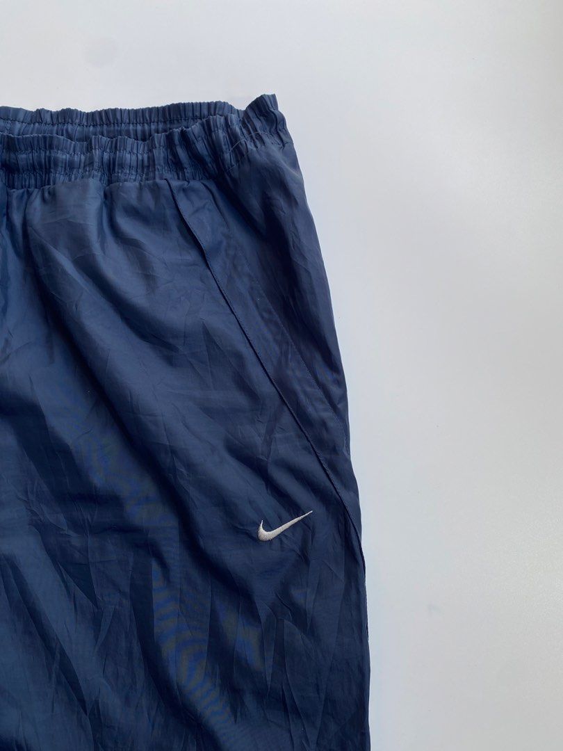 Y2k nike cuffed track pants (Category: Joggers) located in Kalibo. Submitted by kurt_ismael (Listing ID 1466583212, Image 2). Description: Y2k nike cuffed track pants With drawstring & ankle zip Size: 29-38 Length: 41 Excellent condition Color rate: 9.8/10 Need wash only.