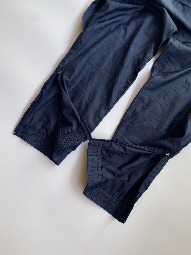 Y2k nike cuffed track pants (Category: Joggers) located in Kalibo. Submitted by kurt_ismael (Listing ID 1466583212, Image 3). Description: Y2k nike cuffed track pants With drawstring & ankle zip Size: 29-38 Length: 41 Excellent condition Color rate: 9.8/10 Need wash only.