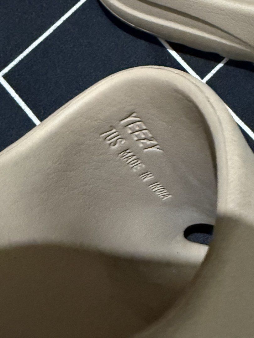 Yeezy Slides Authentic (Category: Slippers & Slides) located in Manila. Submitted by fnmvillaro10715 (Listing ID 1466567544, Image 2). Description: - Item: Yeezy Slides AUTHENTIC - Color: Beige - Size: 7 mens US (Made in India) - Design: Slip-on with textured foam construction and grooved soles - Condition: Worn a few times, clean and well-maintained - Perfect for daily casual wear -No box RFS: Decluttering.