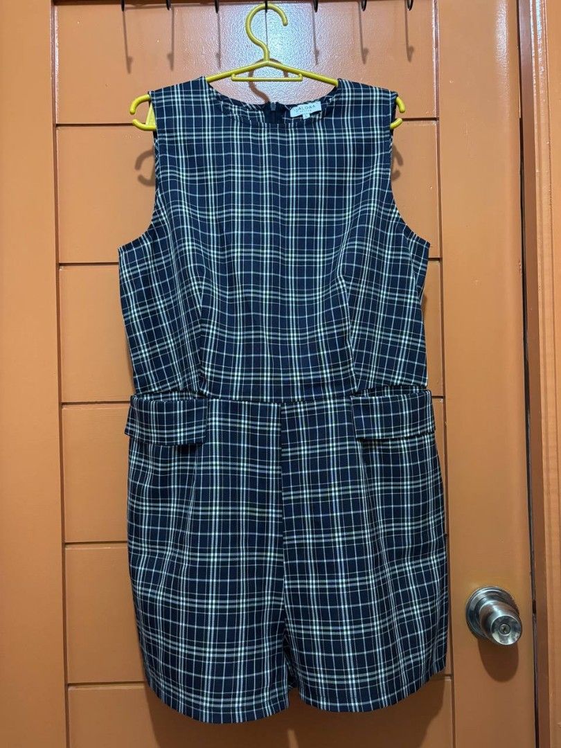 Zalora Plaid Sleeveless Romper Large (Category: Rompers) located in Mandaluyong City. Submitted by soulanaa (Listing ID 1466571477, Image 1). Description: - Length: 31" - Bust: 19" - Waist: 17" - Shoulders: 13.5" Note: with pockets - Brand/Style: Zalora plaid romper - Color: Navy blue with white and grey checks - Size: Large - Features: Sleeveless, round neckline, two front pockets, back zipper closure - Condition: Clean fabric, neat stitching, r