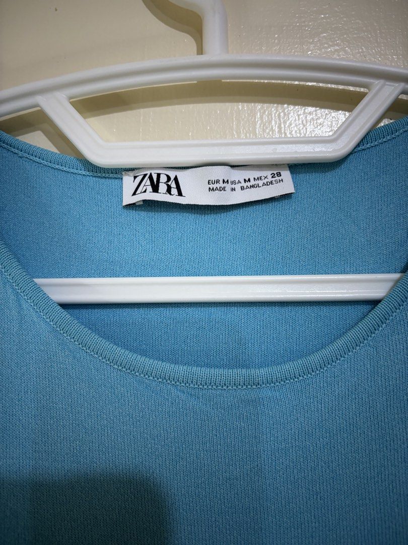 Zara Blue Tank Top Size M (Category: Sleeveless) located in Balayan. Submitted by authenticfindsbymrb (Listing ID 1466711713, Image 2). Description: - Brand: Zara - Size: M (True to size) - Color: Bright blue - Material: Knit texture (Made in Bangladesh) - Design: Classic sleeveless with a round neckline - Style: Versatile for pairing with shorts, skirts, or jeans for casual outfits.