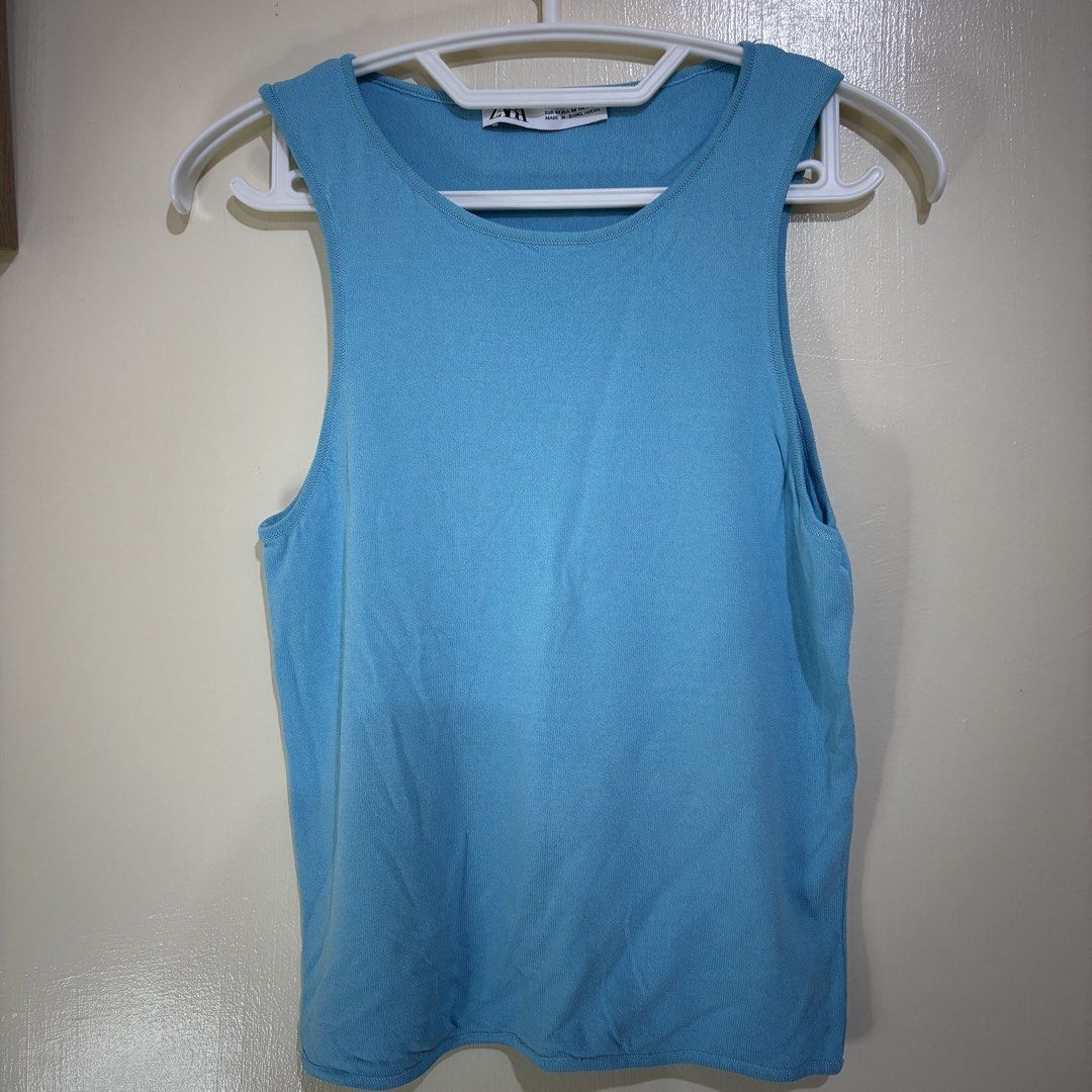 Zara Blue Tank Top Size M (Category: Sleeveless) located in Balayan. Submitted by authenticfindsbymrb (Listing ID 1466711713, Image 1). Description: - Brand: Zara - Size: M (True to size) - Color: Bright blue - Material: Knit texture (Made in Bangladesh) - Design: Classic sleeveless with a round neckline - Style: Versatile for pairing with shorts, skirts, or jeans for casual outfits.