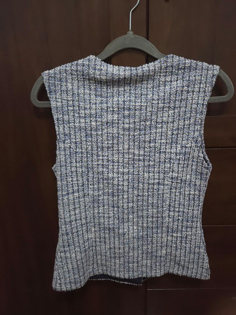 Zara Blue Tweed Vest Size M (Category: Sleeveless) located in Quezon City. Submitted by sashasarisarishoppe (Listing ID 1466673810, Image 3). Description: - Brand: Zara - Style: Double-breasted tweed vest with front patch pockets - Colorway: Blue, white, and black mix with blue and gold striped inner lining - Accents: Elegant gold buttons - Size: Medium (fits true to size) - Condition: Brand new with tags (BNWT).