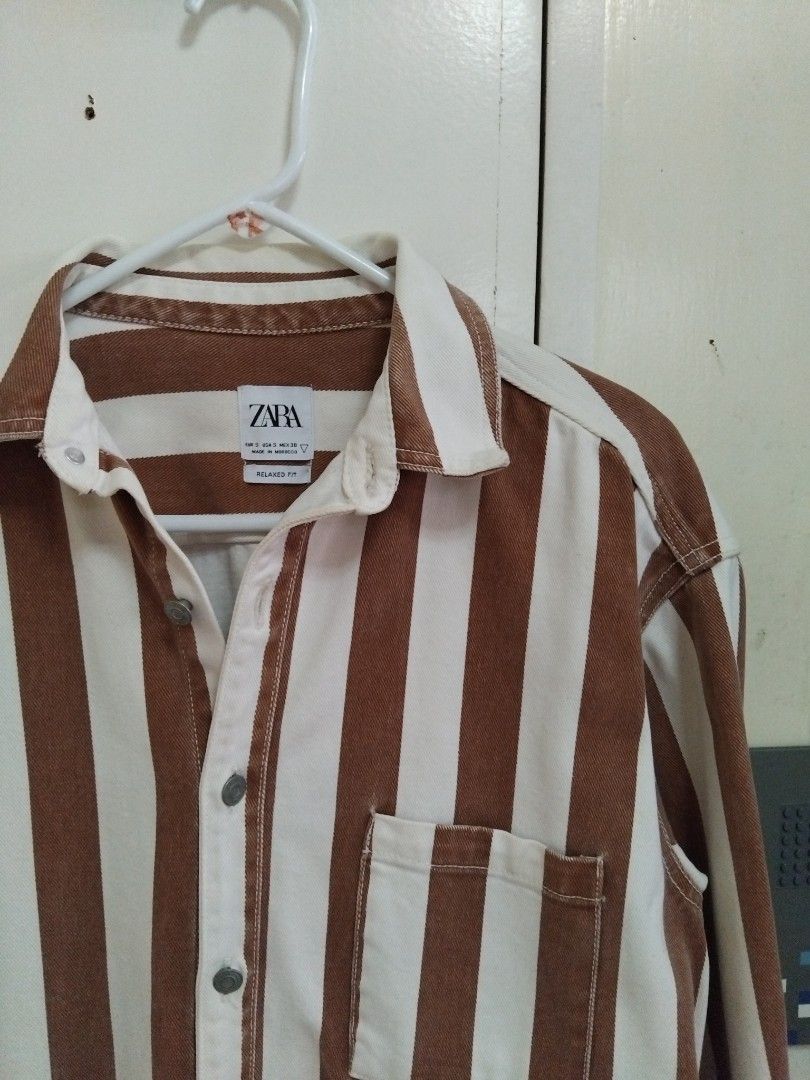 Zara Brown Striped Relaxed Fit Denim Jacket (Category: Coats, Jackets and Outerwear) located in Pasig City. Submitted by hustlexcurate (Listing ID 1466589952, Image 3). Description: Zara Brown Striped Relaxed Fit Denim Jacket Size S on tag fits MEDIUM Dimensions: 22X27.