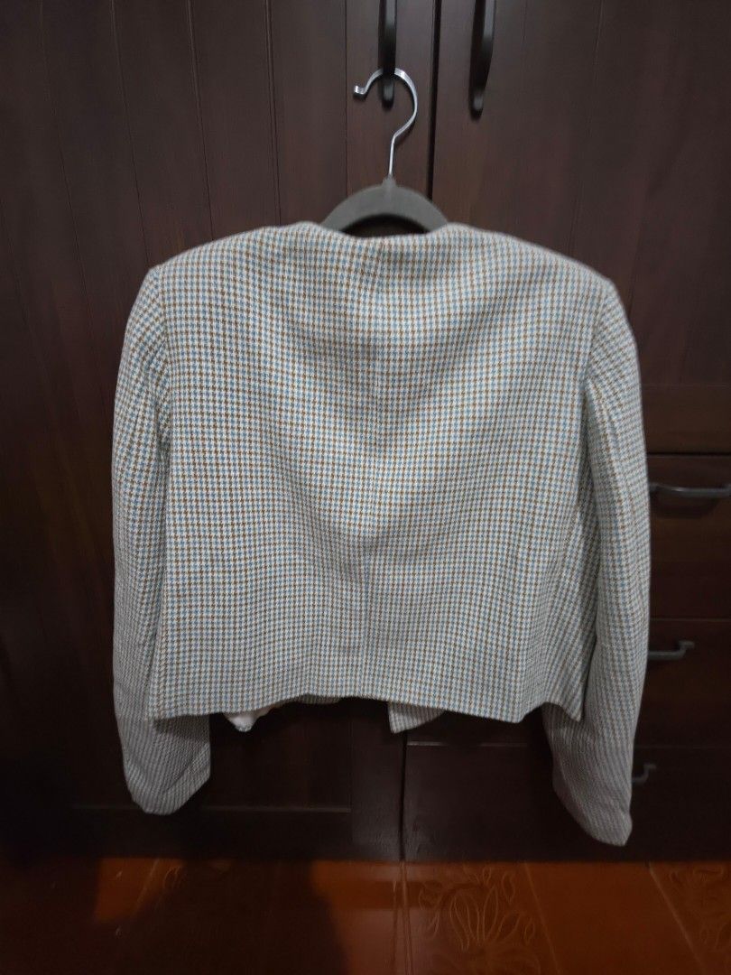 Zara Houndstooth Tweed Jacket Size M (Category: Coats, Jackets and Outerwear) located in Quezon City. Submitted by sashasarisarishoppe (Listing ID 1466665504, Image 2). Description: - Brand: Zara - Style: Tweed jacket in blue, brown, and white houndstooth - Size: Medium (fits true to size) - Details: Crew neck, front pockets, elegant gold-tone buttons - Origin: Made in Morocco - Condition: Clean fabric with a lovely textured knit pattern - Ideal 