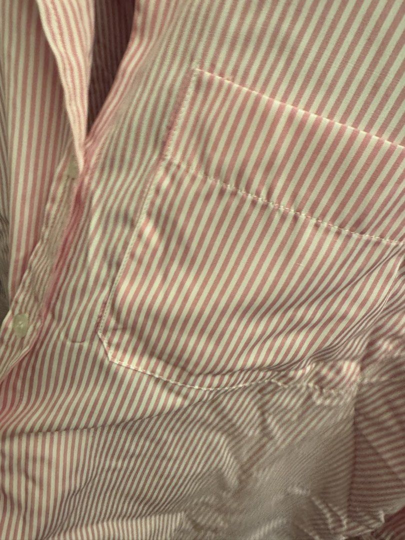 Zara Pink Striped Button-Down Shirt Size M (Category: Shirts) located in Makati City. Submitted by 099baby (Listing ID 1466695632, Image 2). Description: - Brand: Zara - Condition: Brand new with tags, unworn - Size: Medium (M) - Fit: Regular fit - Pattern: Pink and white striped - Details: Classic collar, button-down front, and chest pocket 🤍 Originally bought for PHP1695.